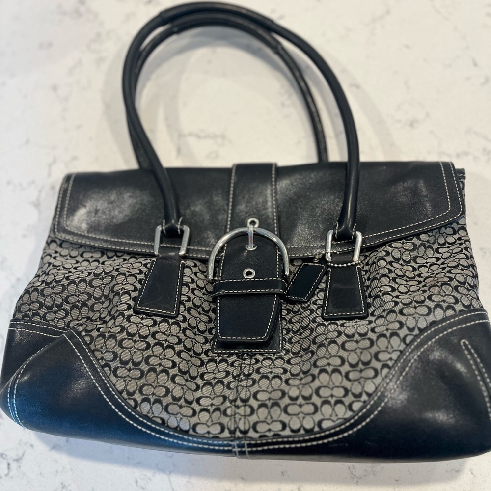 Coach black leather bag.